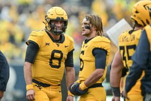 Greene's status still uncertain, WVU coaches comfortable with Marchiol